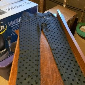 Dressy black leggings with velvet polka dots, gold faux zippers on front